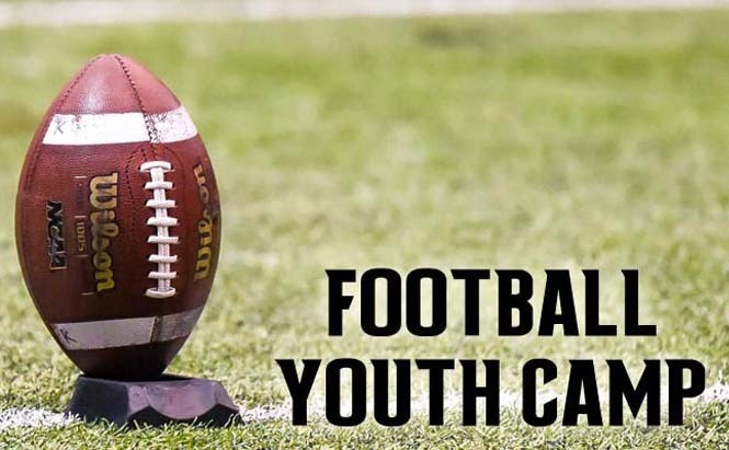 Football youth Camp , with a football and green field.