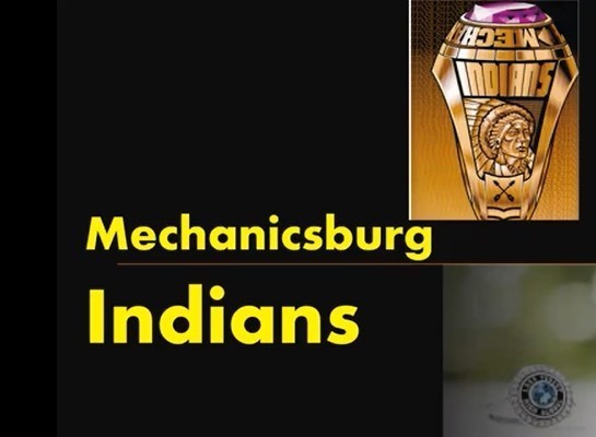 Mechanicsuburg Indians written in yellow written on black background. On the right of the words there is a gold class ring. The class ring as the words Indians written on it, with a picture of an Indian. The lower picute is a silver class ring with black and blue.