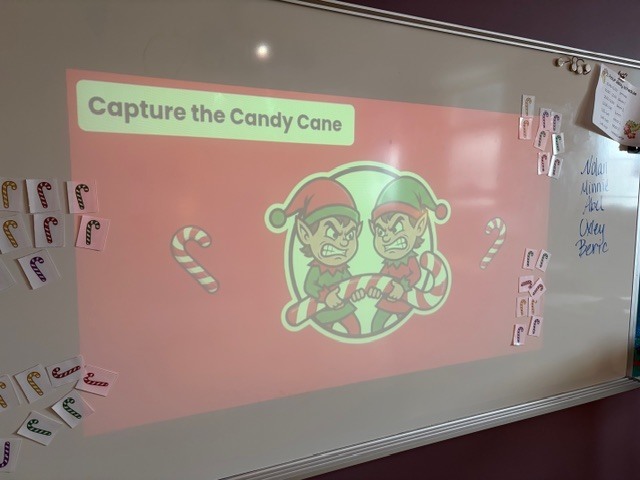 Capture the Candy Cane-Math Review was a success!  3rd-grade students practicing for their test and having fun showing what they know!  