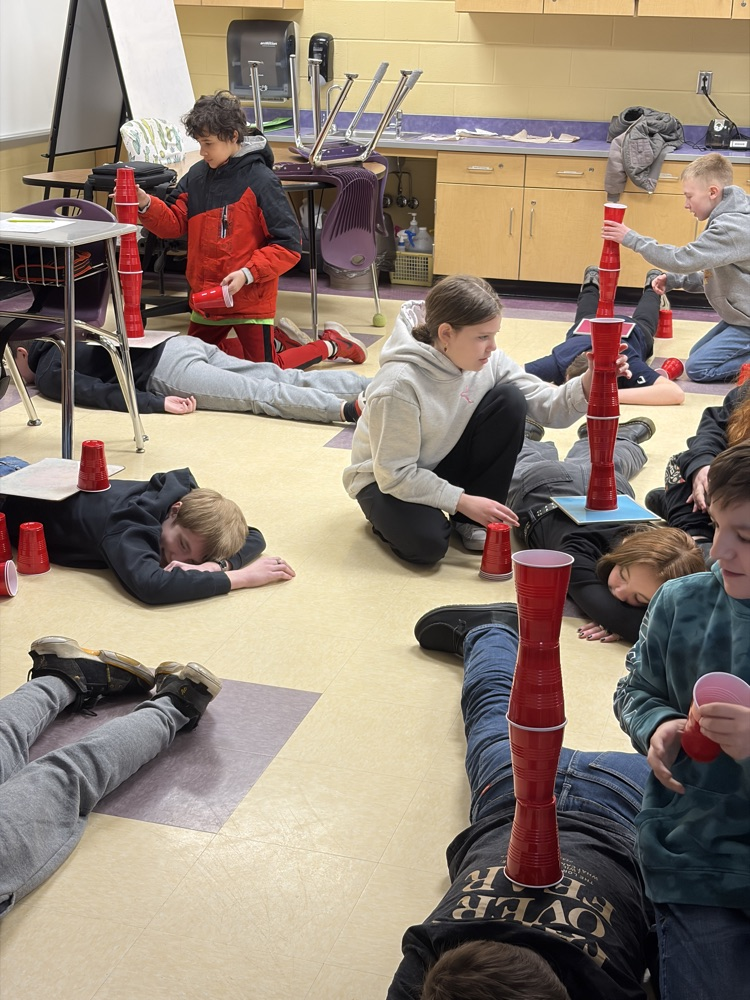 ELA-Partnered up for some Q and A. Earned a cup for every correct answer and the team with the biggest tower after 2 minutes won! ELA fun Friday!