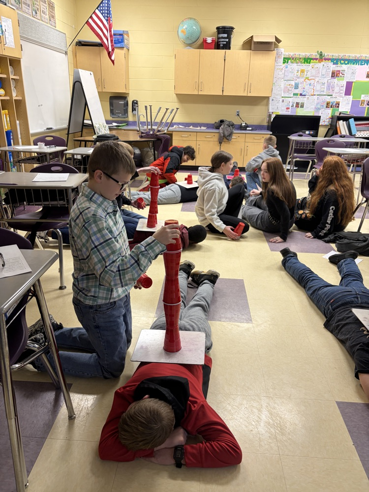 ELA-Partnered up for some Q and A. Earned a cup for every correct answer and the team with the biggest tower after 2 minutes won! ELA fun Friday!