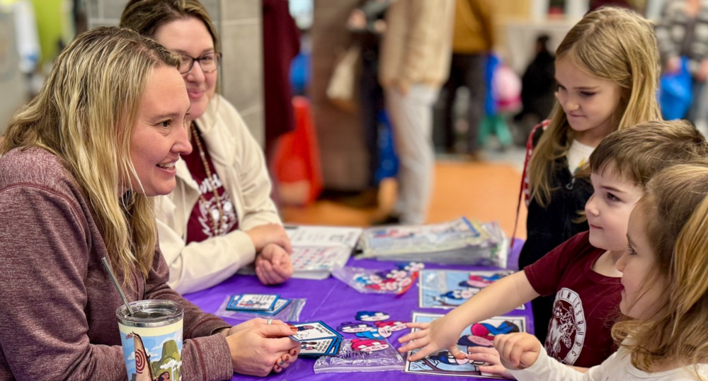 Students and teachers playing a game.