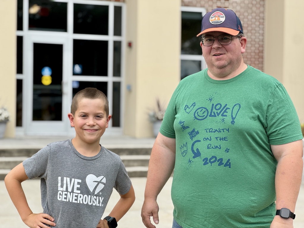 Father and son outside of a school