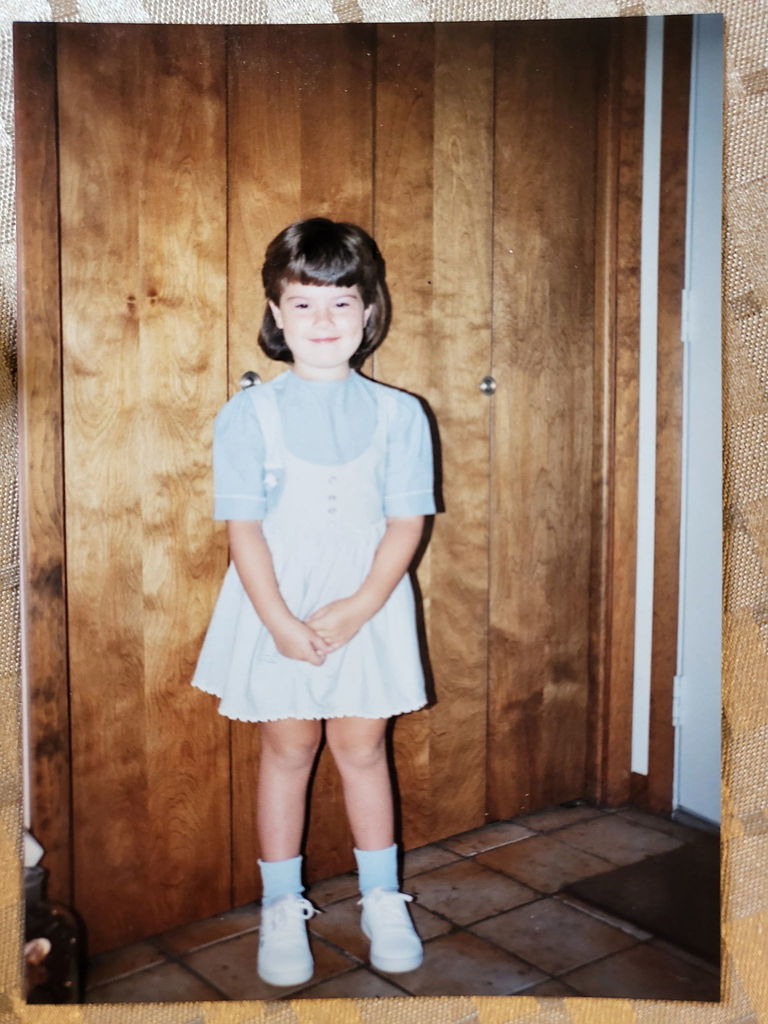 Young girl on first day of school