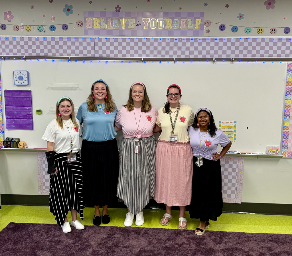 A group of smiling teachers.