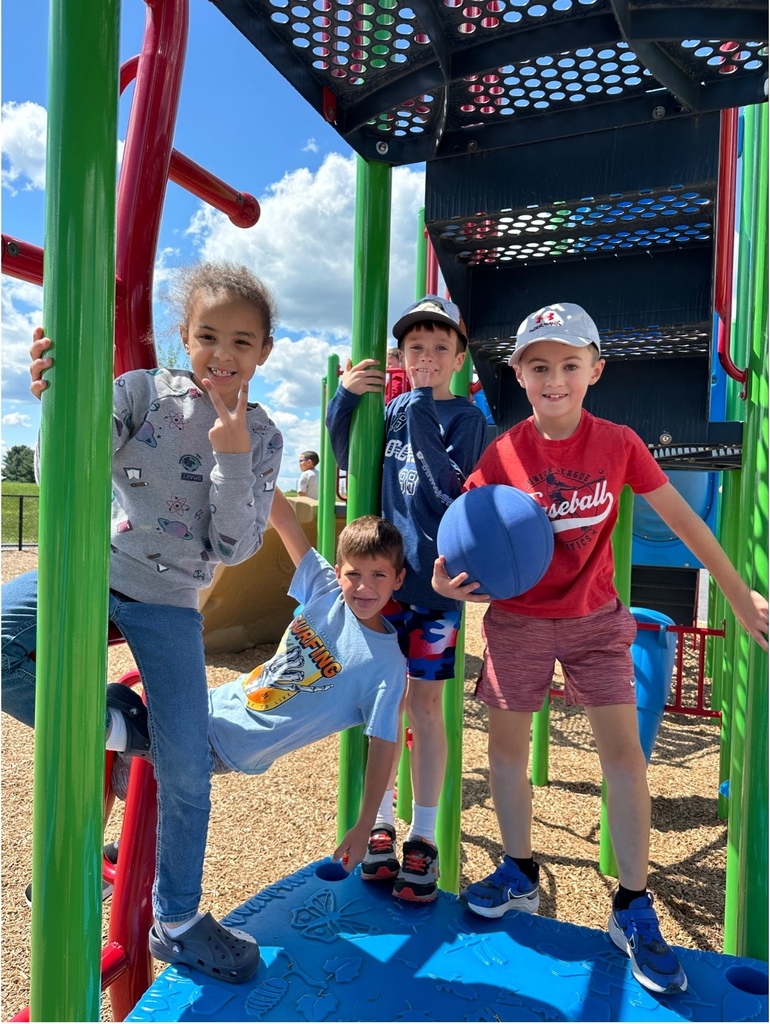 Young kids at recess on playground equipment
