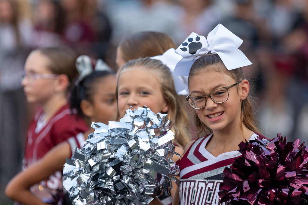 Youth cheerleaders at a game
