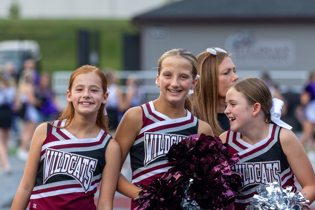 Youth cheerleaders at a game