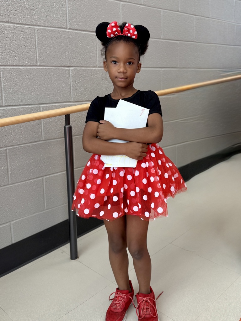 Young student wearing red and white polka dot minnie mouse inspired outfit