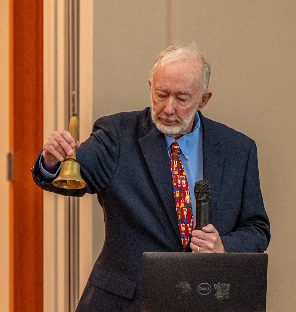 Gentleman ringing gold bell