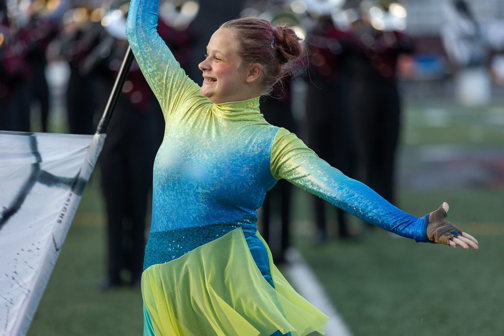 Members of the marching band playing during a show