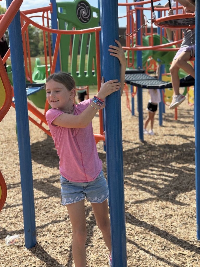 Students climb during recess