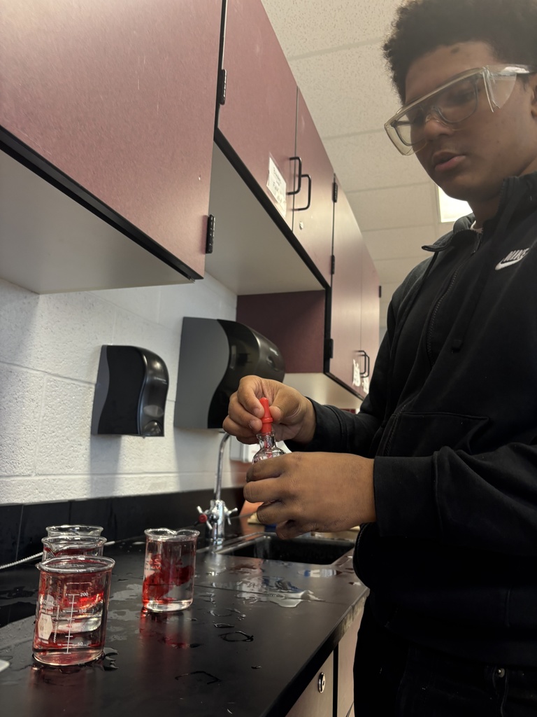Students using dry ice in a middle school science lab.