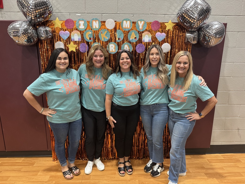 Group of teachers wearing Life of a Reading Specialist shirts