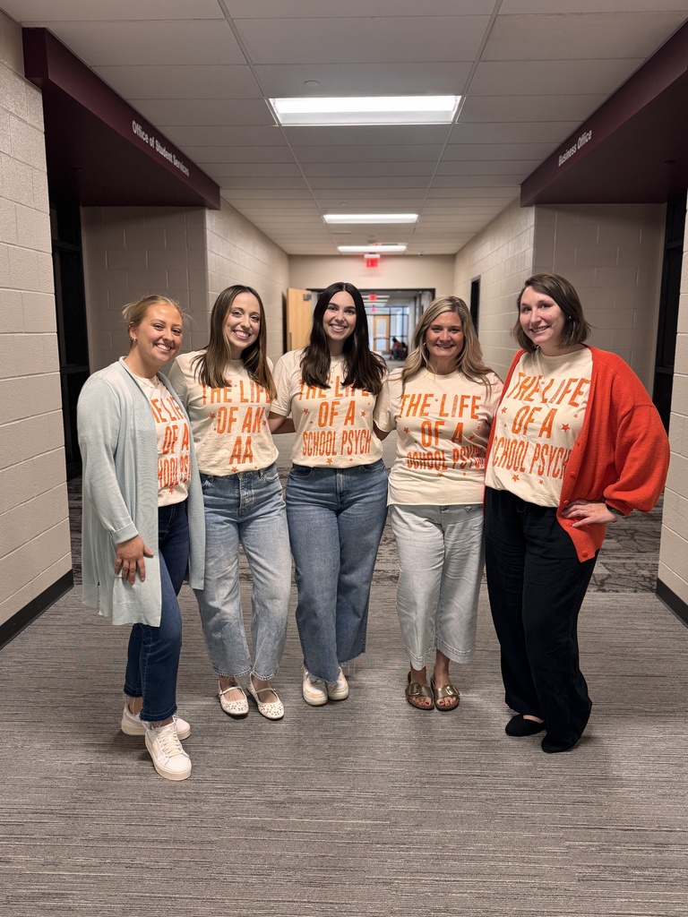 Group of staff wearing their "Life of a ..." shirts.