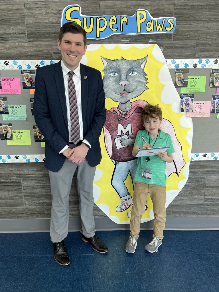Mr. E with principal for a day winner