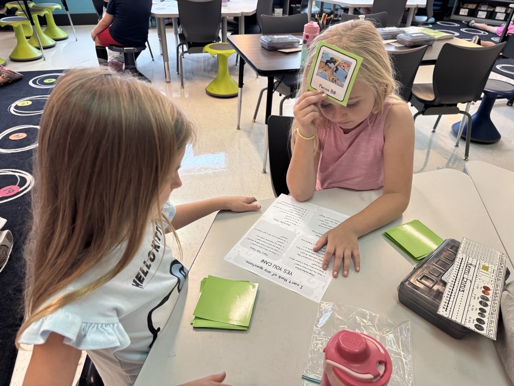 Students play HeadBandz.