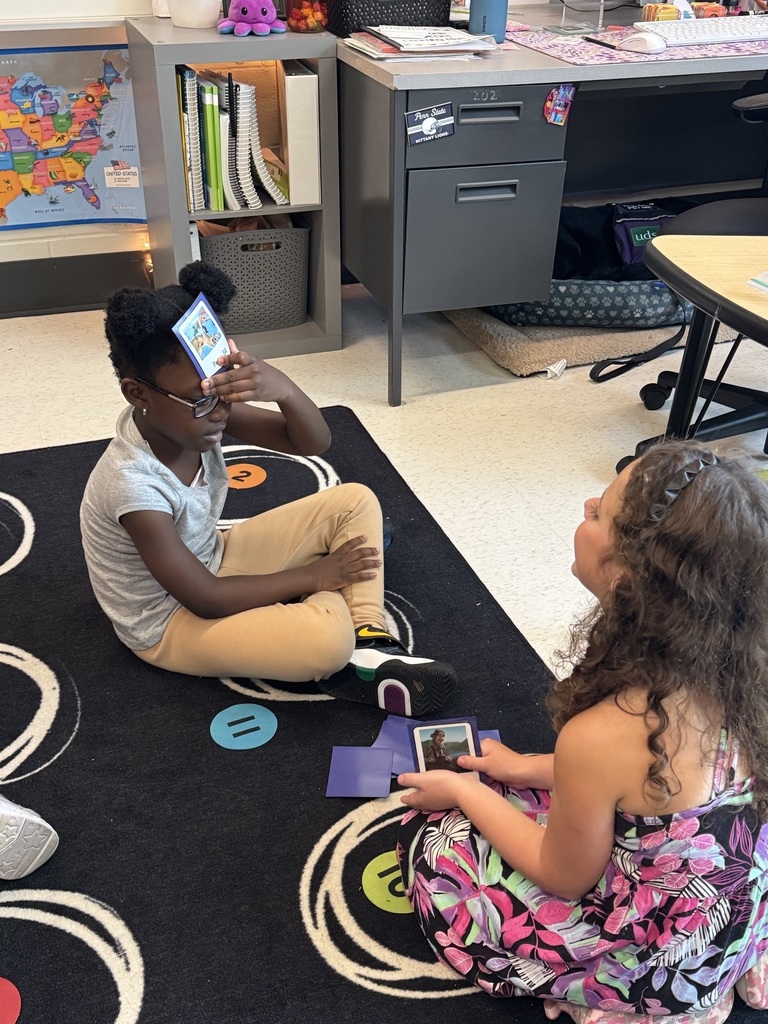 Students play HeadBandz.