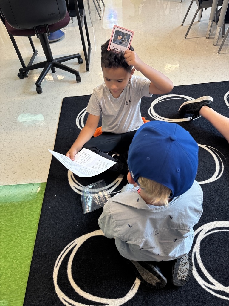 Students play HeadBandz.