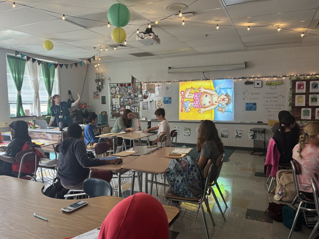 Students in class solving math problems