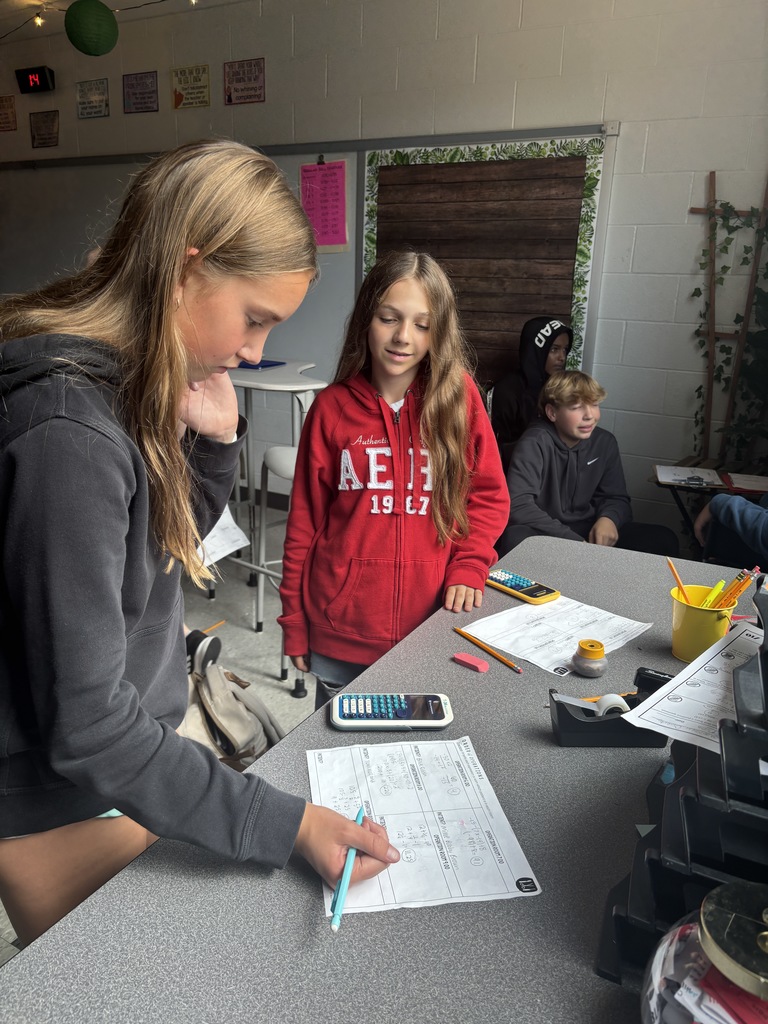 Students use order of operations to solve math problems.