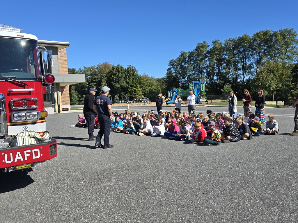 Firefighters talking to our 3rd grade classes