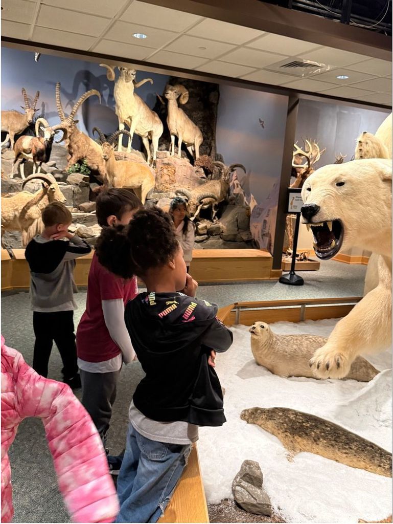 image of students with polar bear