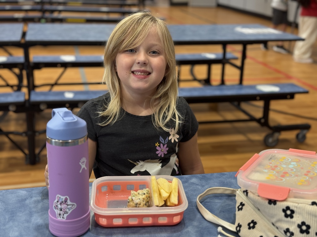 A student enjoying her homemade lunch.