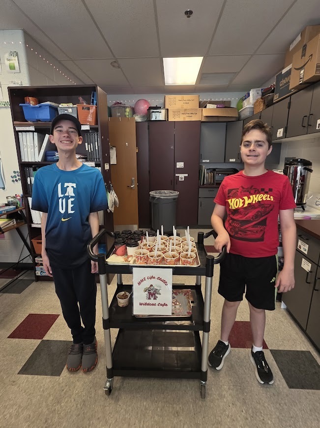 Students deliver fresh baked apple crisp to teachers.