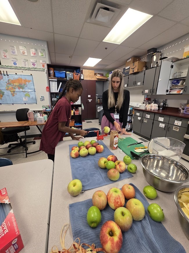 Students peel apples