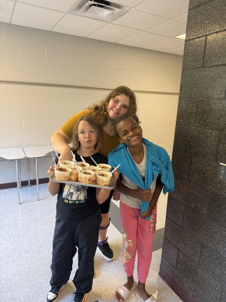 Students with fresh baked apple crisp.
