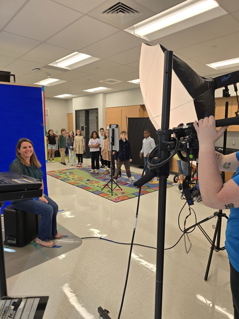 Taking photo of teacher/class