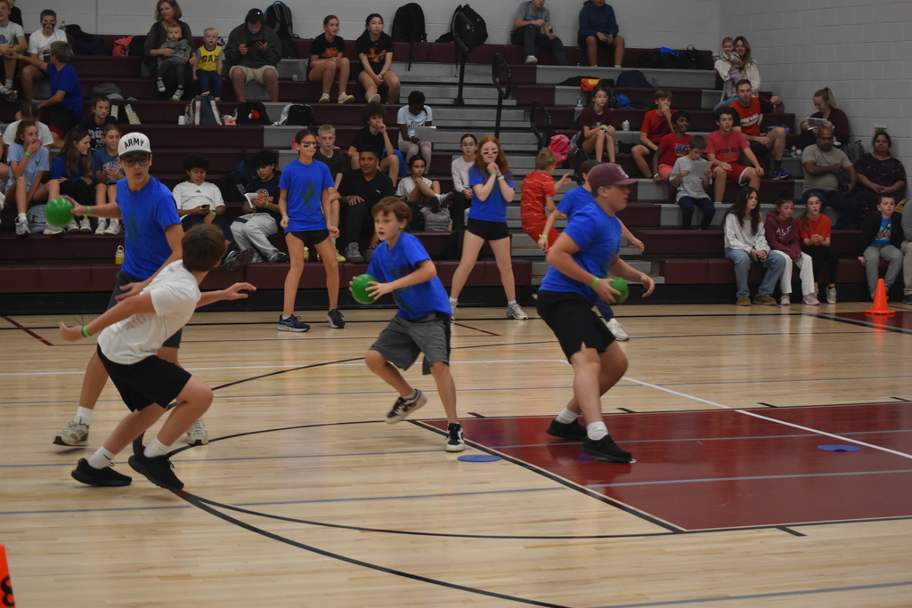 Students playing dodgeball.