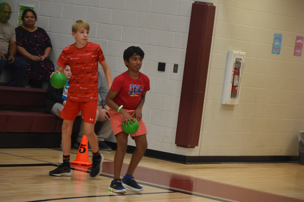 Students playing dodgeball.