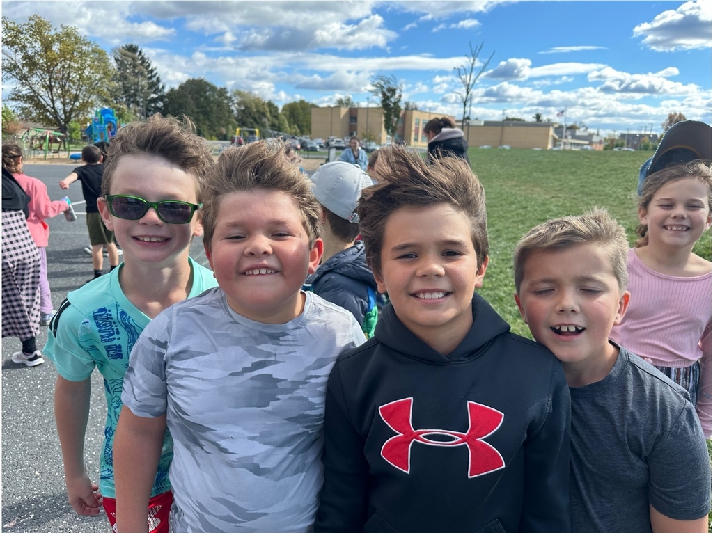 photo of students at recess on a windy day