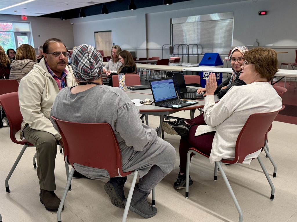 Staff members collaborating during professional development.