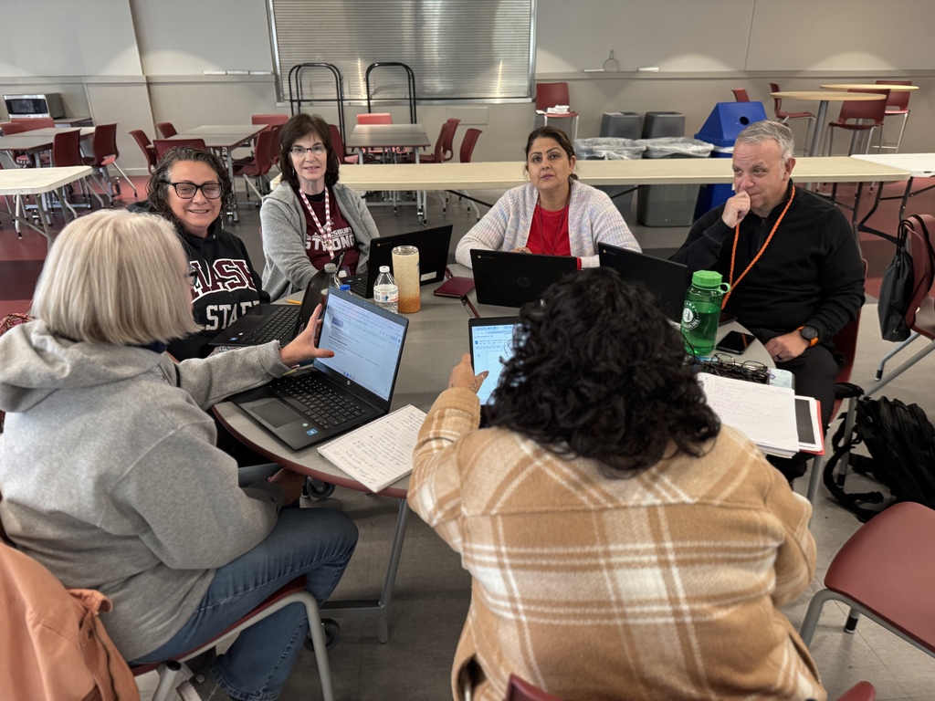 Staff members collaborating during professional development.