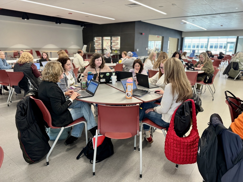 Staff members collaborating during professional development.