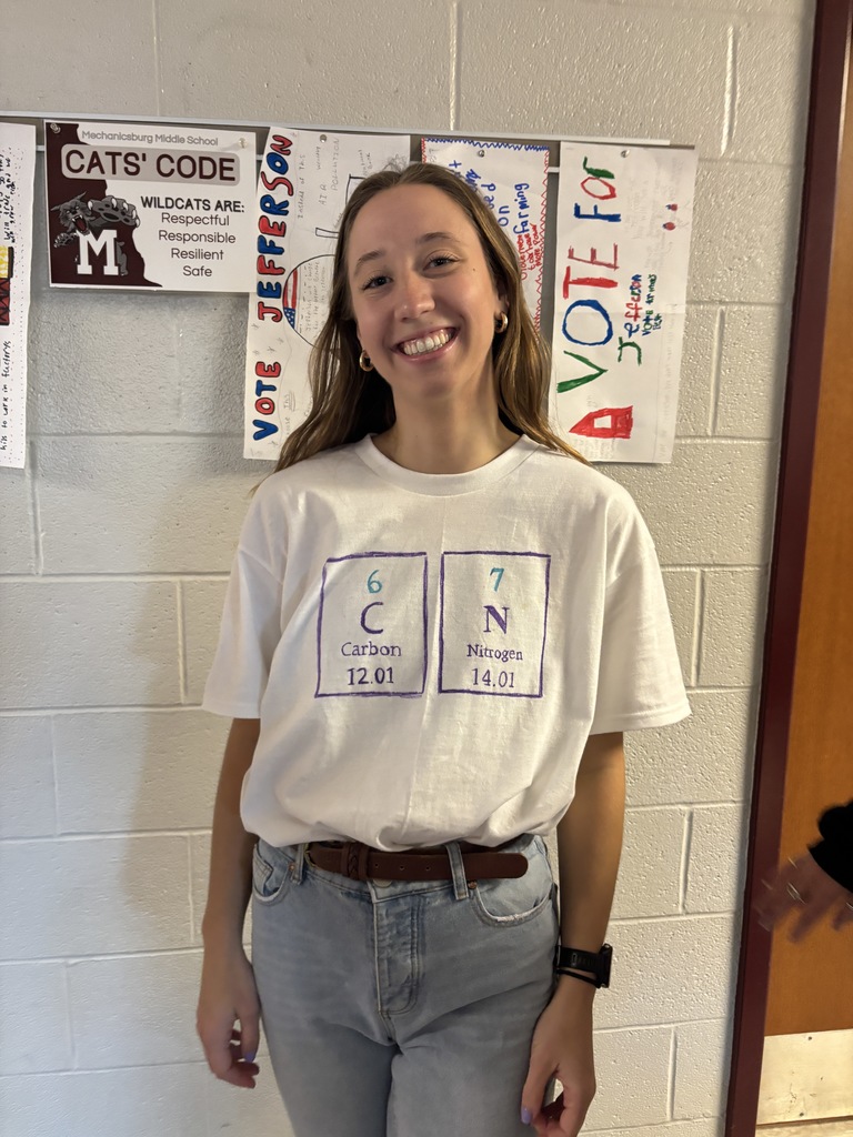 A teacher in a 6-7 outfit.