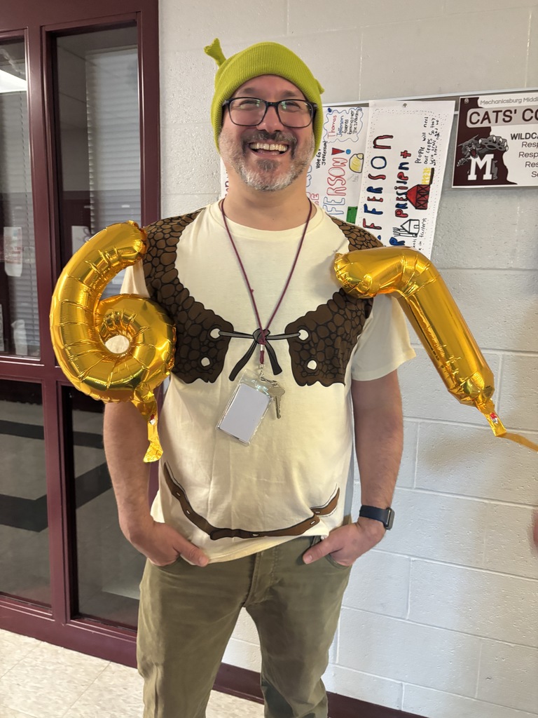 A teacher in a 6-7 outfit.