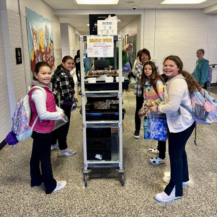 young students pick breakfast items