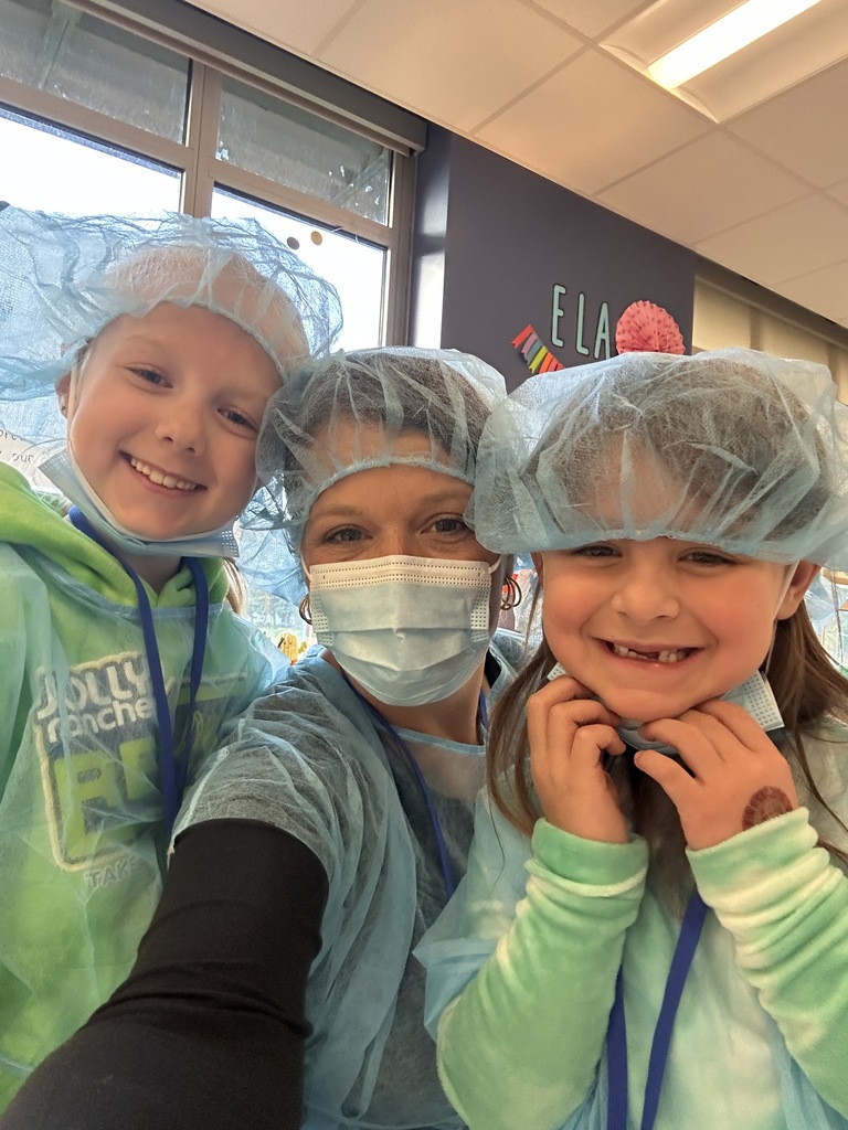 Students dressed as doctors for a classroom activity.