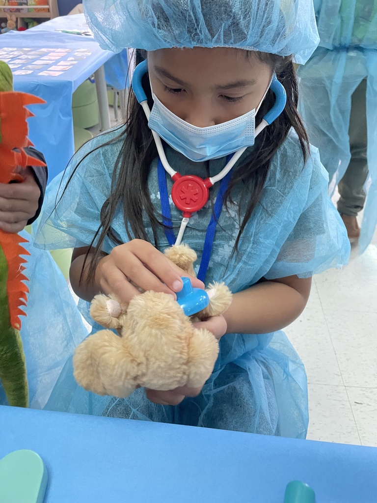 A student dressed as a doctor for a classroom activity.