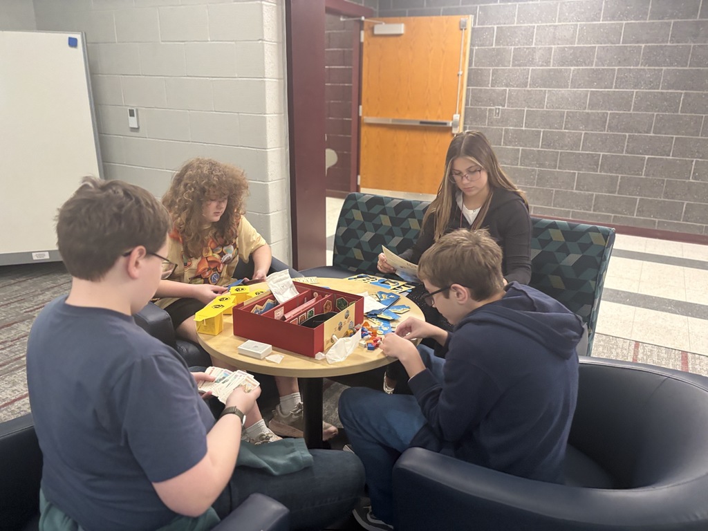 Students participate in an afterschool gaming club.