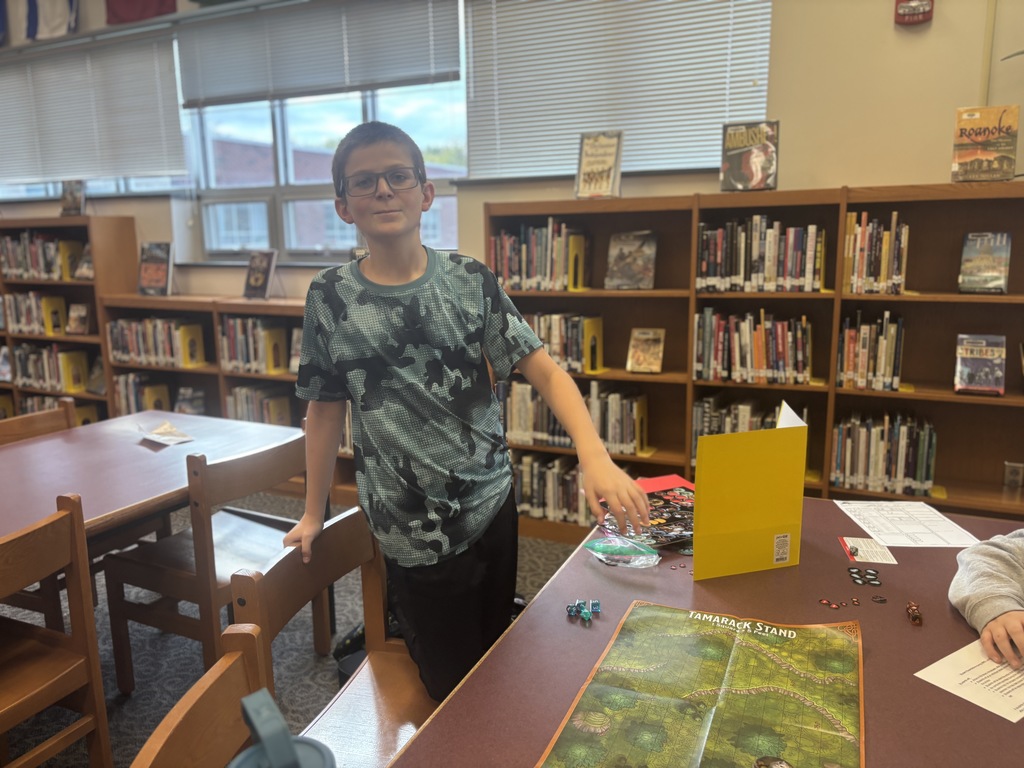 Students participate in an afterschool gaming club.