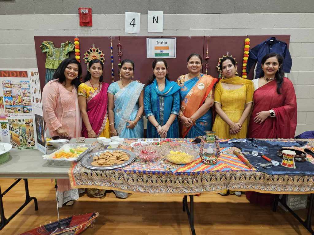 Participants in colorful attire during a World Expo Day.