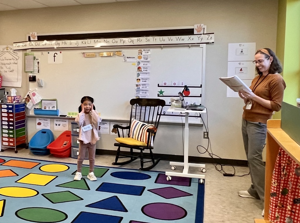 A young student acting out a folktale.