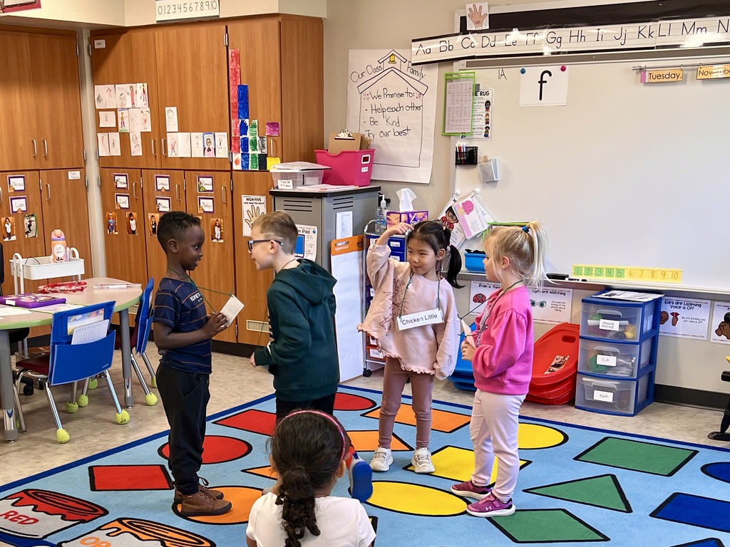 A group of young students acting out different folktales.