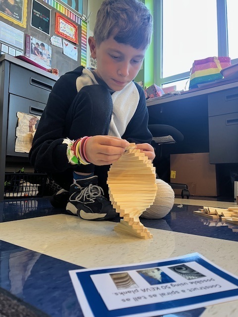 A young student with building blocks.