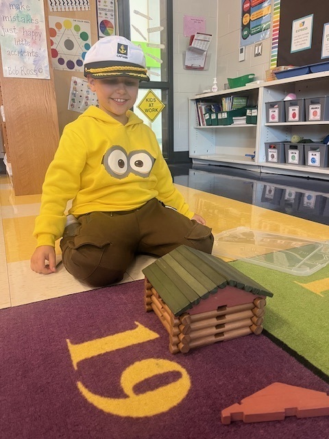 A young student with building blocks.